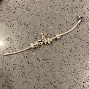 Pandora bracelet with charms
